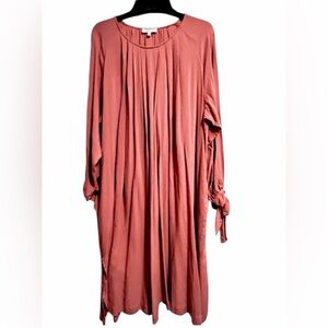 Hailey & Co boutique apricot orange swing dress w/side pockets bow tie sleeve